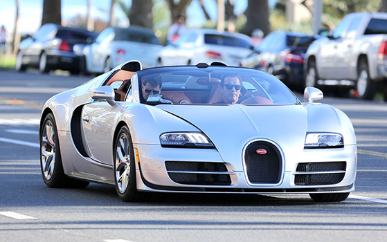 *EXCLUSIVE* Arnold Schwarzenegger meets with friends in his Bugatti Veyron