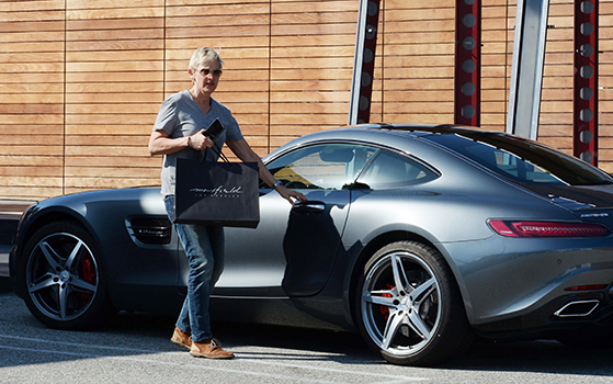 Comedienne Ellen Degeneres is spotted heading to her souped up McClaren Mercedes Benz after shopping at Maxfields Clothing store in West Hollywood, Ca